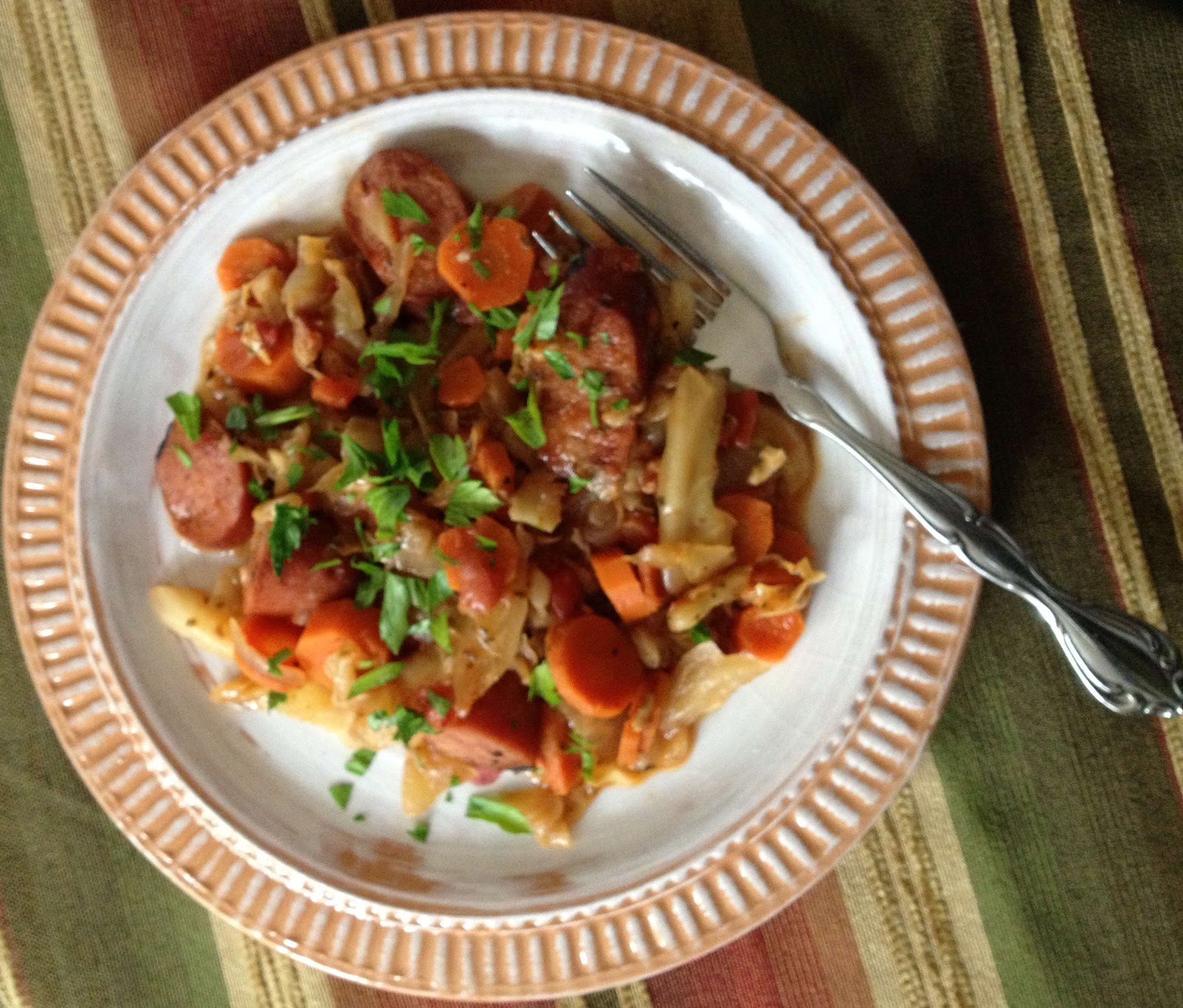 Sprigs of Rosemary Sweet and Tart Cabbage Stew with Kielbasi