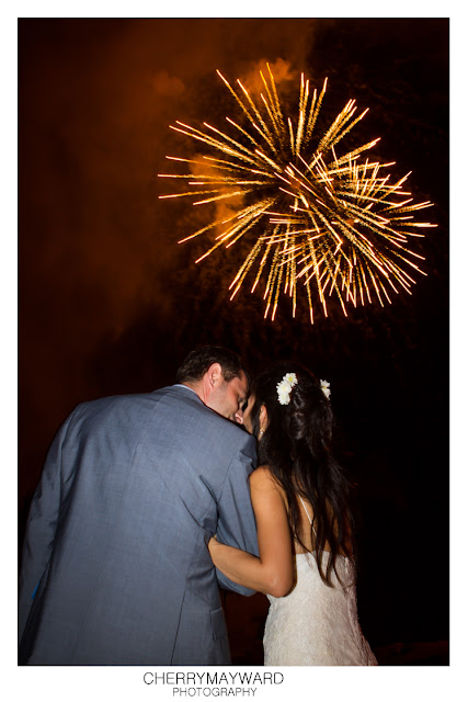 Beach Republic wedding fireworks. Married couple watching fireworks.