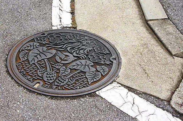 manhole cover, street, sidewalk