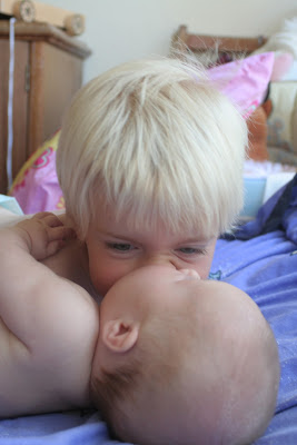 Anton kissing Neve.