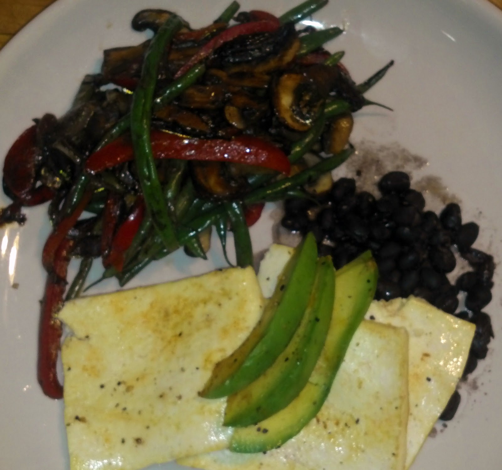 Kale and Caviar Tequila/LimeMarinated Tofu and Avocado with Green