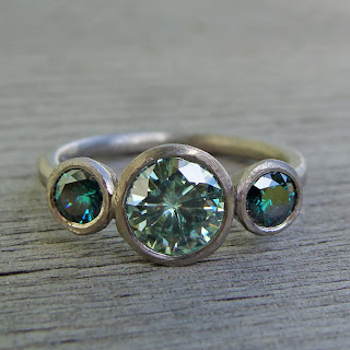 green moissanite ring