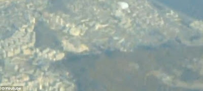 UFO Sighting Filmed From Airplane