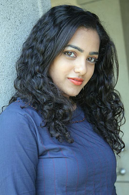 Nithya Menon New Hot Photo Shoot | Jhakkaz