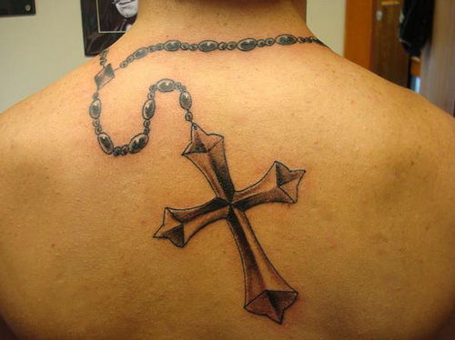 cross tattoo on back Celtic Tattoos 