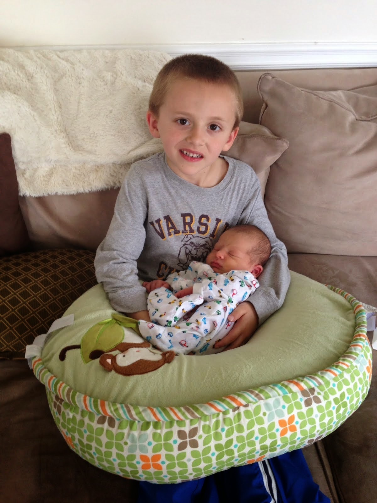 Harper holding baby Mason