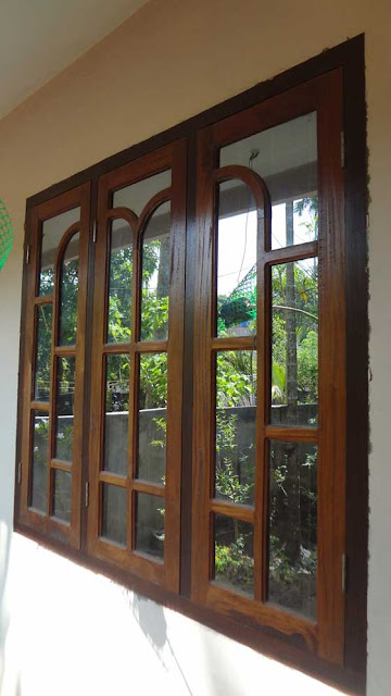 Latest kerala model Wooden Window Door Designs - Wood Design Ideas