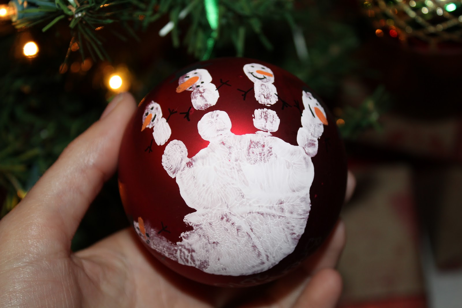 Cup of Daisies: Snowman Hand print Ornament