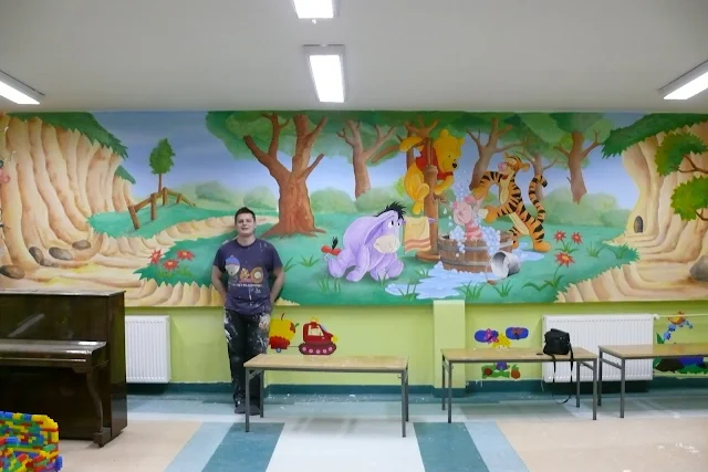 Bydgoszcz, usługi malarskie, malowanie w przedszkolu ścian w motyw z bajki Kubusia Puchatka, mural 3D, aranżacja ściany