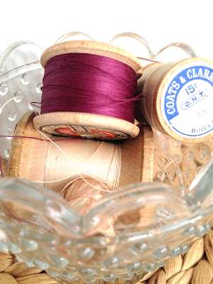 Vintage Thread Spools in a glass ikea bowl