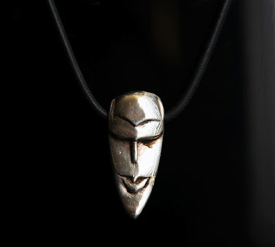 expression side of unnamed pendant by alex streeter
