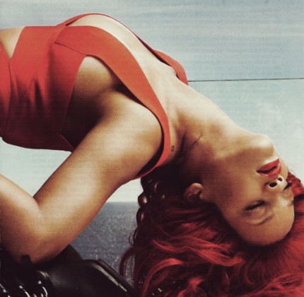 rihanna red hair 2011. Her firey red hair is paired