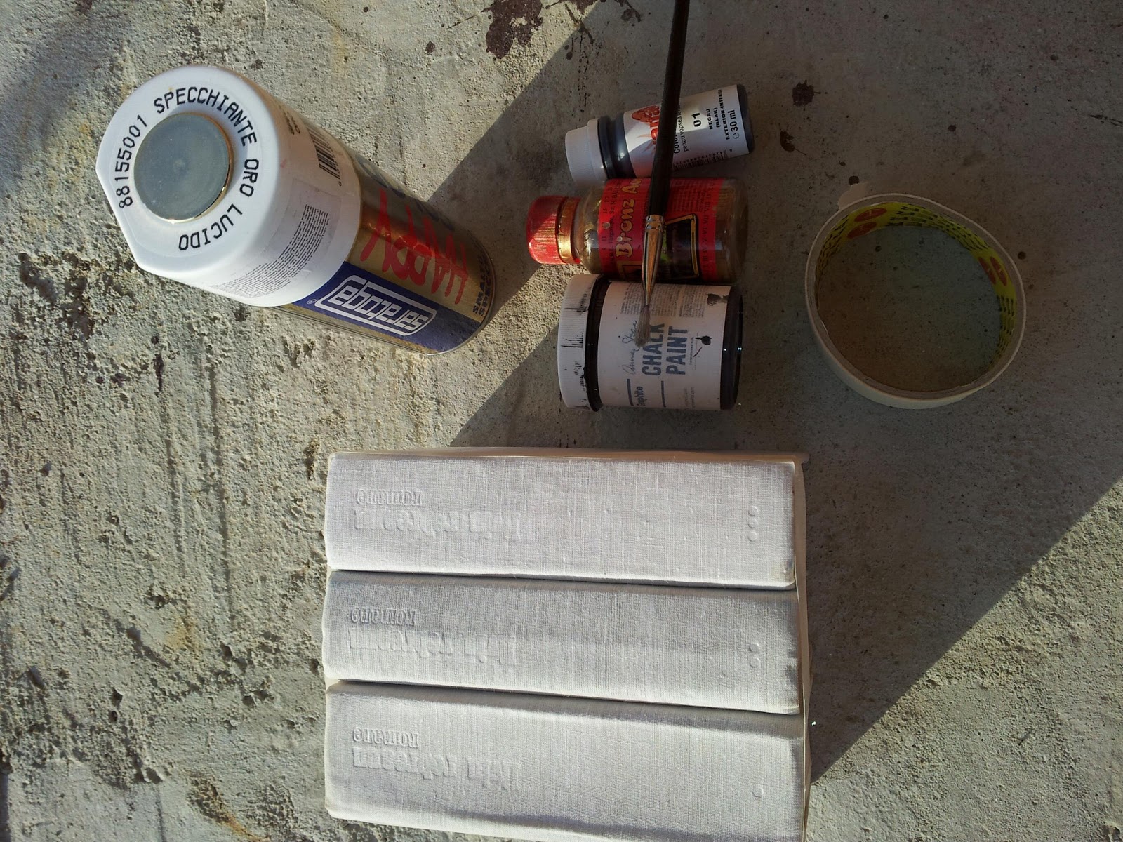 by Ozana Gold spraypainted books (diy)