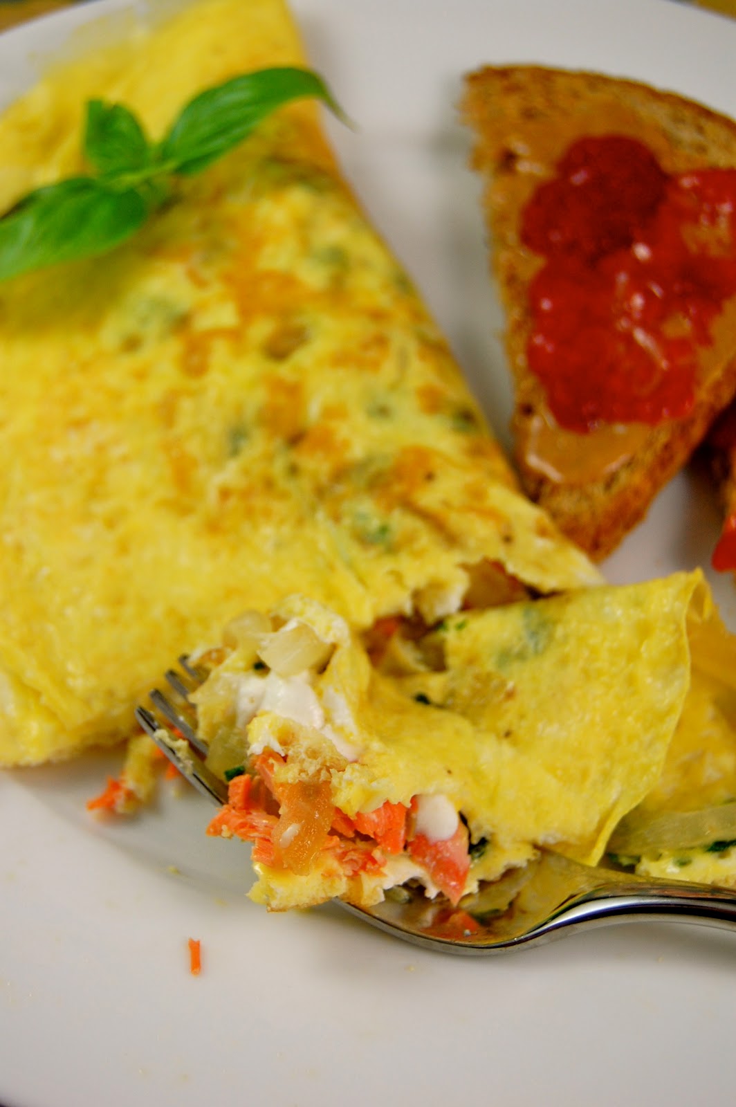 La Petite Maison Verte Salmon Omelette with Caramelized Onions, Spinach and Chevre