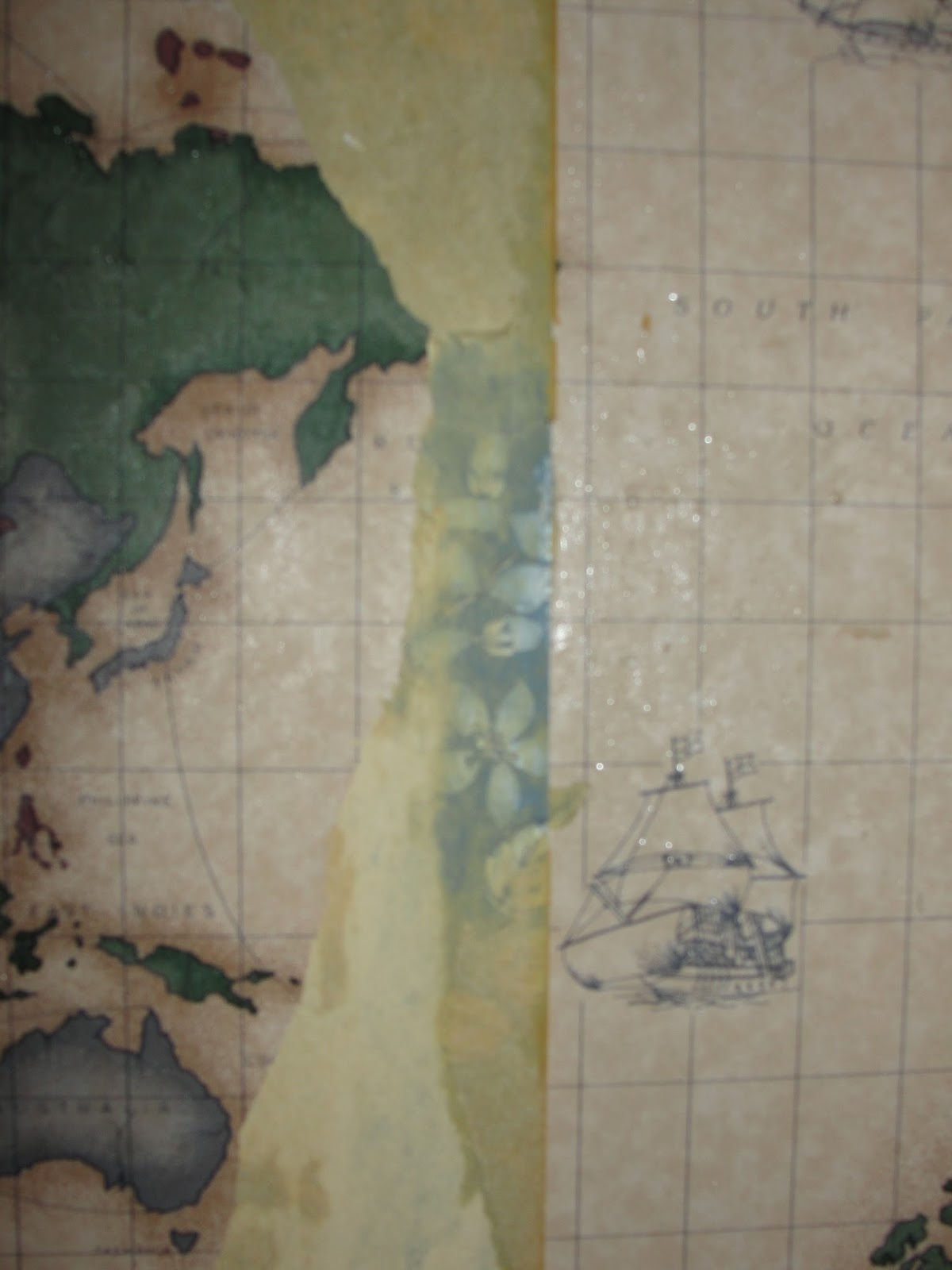 underneath the old world map wallpaper was another lovely wallpaper