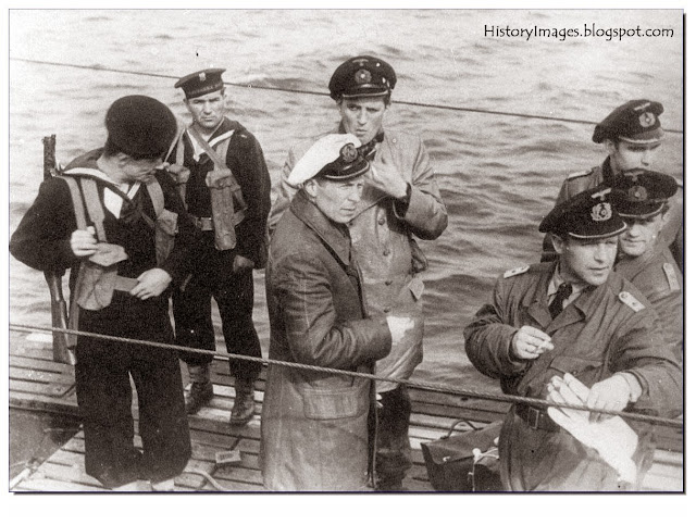 A German U-Boat crew surrender to Polish sailors at the British port of Portland The U-Boat captain is Lieutenant zur See Uwe Kock