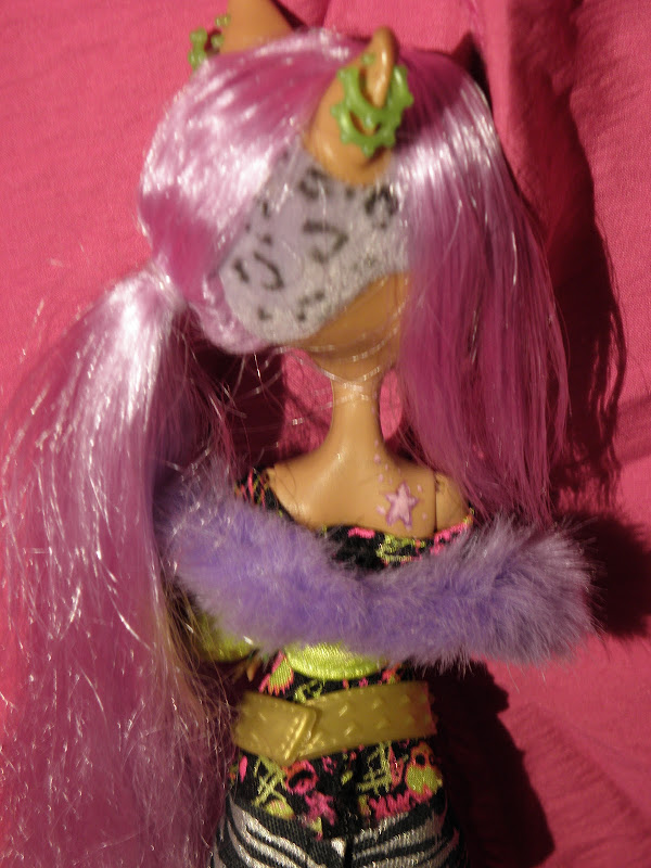 repainted her face, made some tattoos and piercings. Lastly I title=