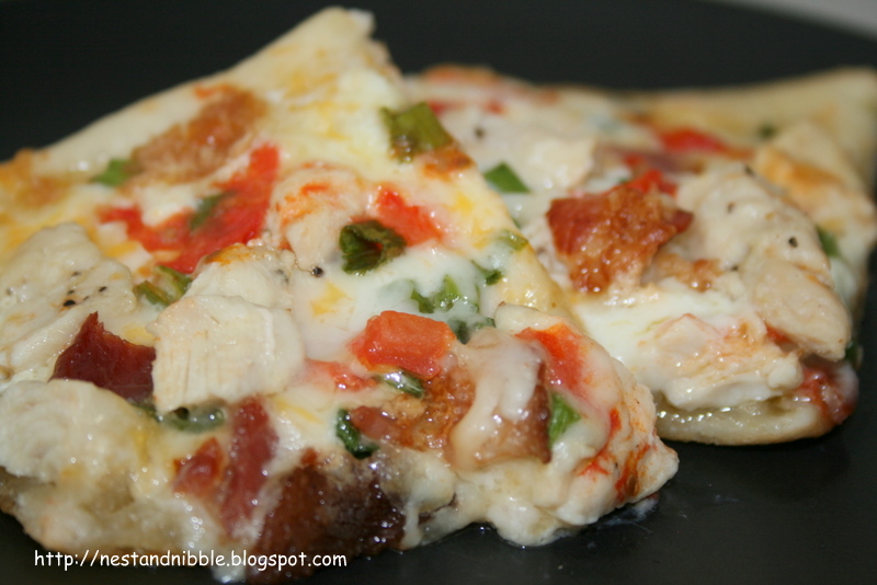 Nest and Nibble White Sauce Chicken, Bacon, and Artichoke Heart Pizza