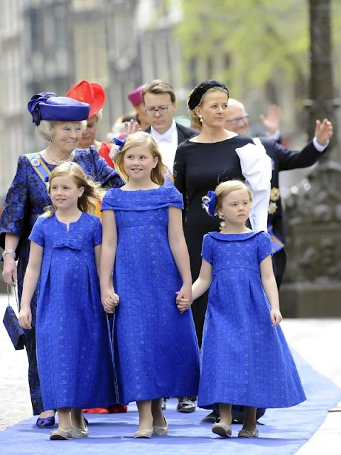 Dutch King Willem-Alexander and his wife Queen Maxima arrive to attend a religious ceremony at the Nieuwe Kerk church in Amsterdam