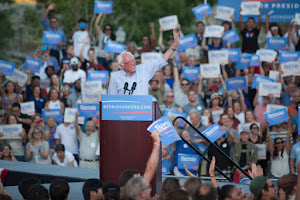 <b><a href="http://BernieSanders.com/">Go Bernie Sanders</a></b>!