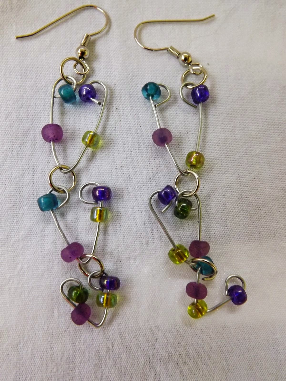 http://www.ebay.com/itm/Decending-Heart-Earrings-Handmade-glass-dangle-with-stainless-steel-hook-/261770352940?fb_action_ids=318219618366541&fb_action_types=og.shares&fb_source=other_multiline&action_object_map=%5B857778784264377%5D&action_type_map=%5B%22og.shares%22%5D&action_ref_map=%5B%5D