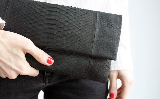 python leather clutch