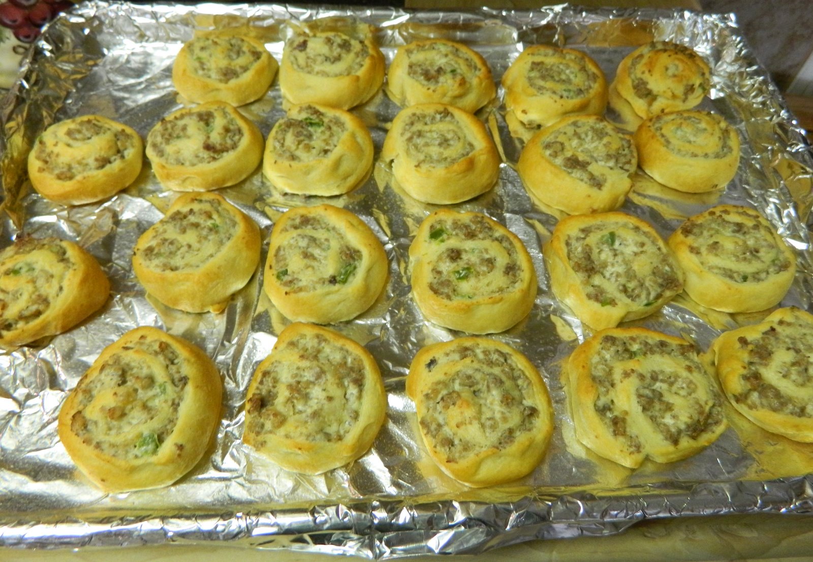 Sugar Spice and Spilled Milk Cream Cheese Jalapeño Sausage Pinwheels