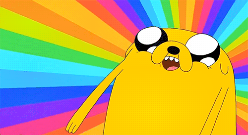 Animated gif of Jake the Dog with a really happy face and big eyes with a spinning rainbow background.