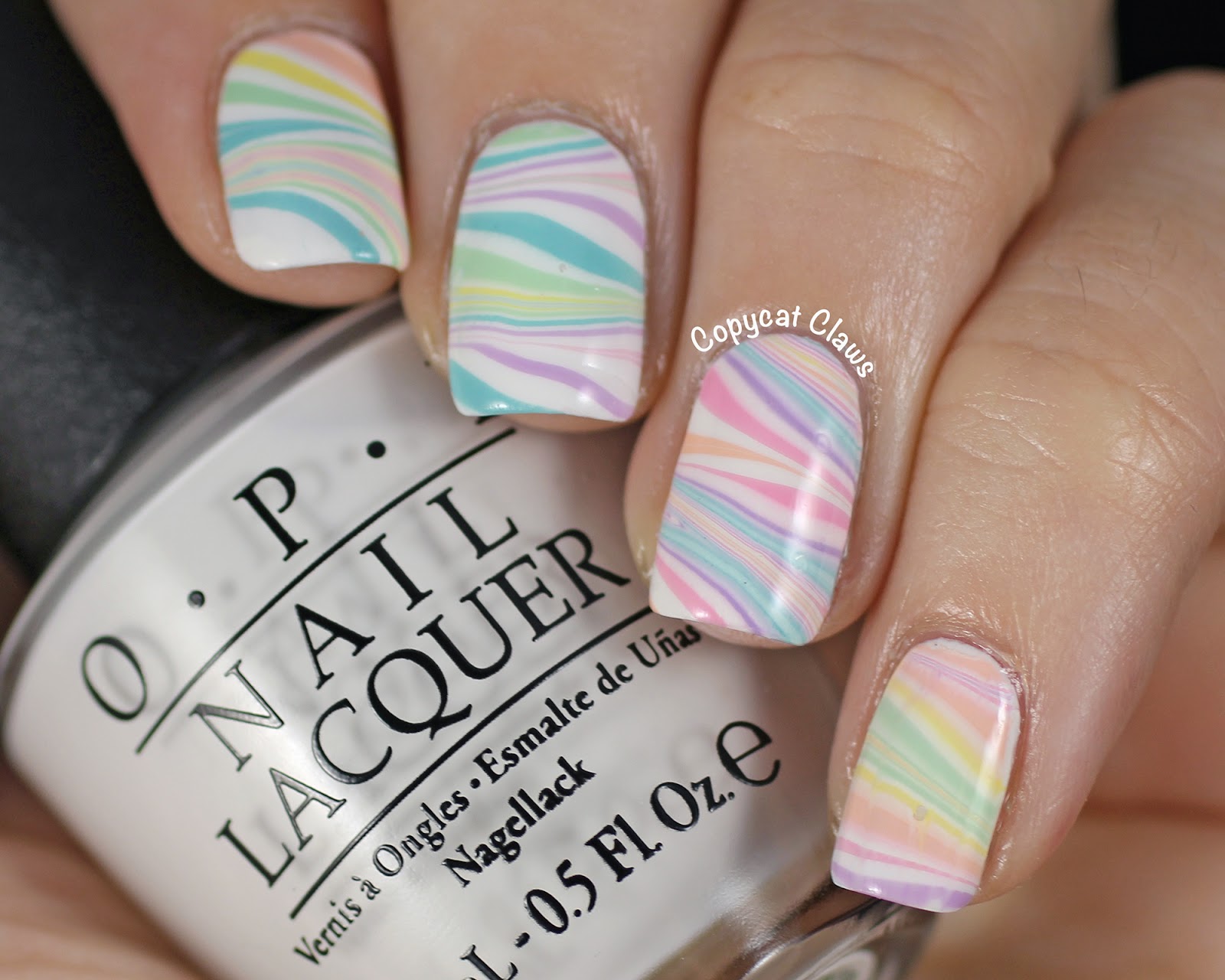 3. How to Create a Stunning Water Marble Nail Design - wide 1