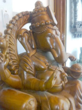 Lord Ganesha in teak wood