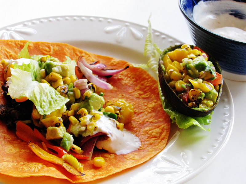themustardseed...... Spicy black bean wrap with mango, avocado and burnt corn salsa