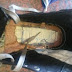 A woman visiting Radovan Krejcir in prison was arrested after a cellphone hidden in a shoe began ringing