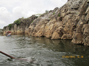 Boat ride along Bhedaghat  viewing the marble  rocks.