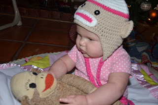 Cute baby in a monkey hat