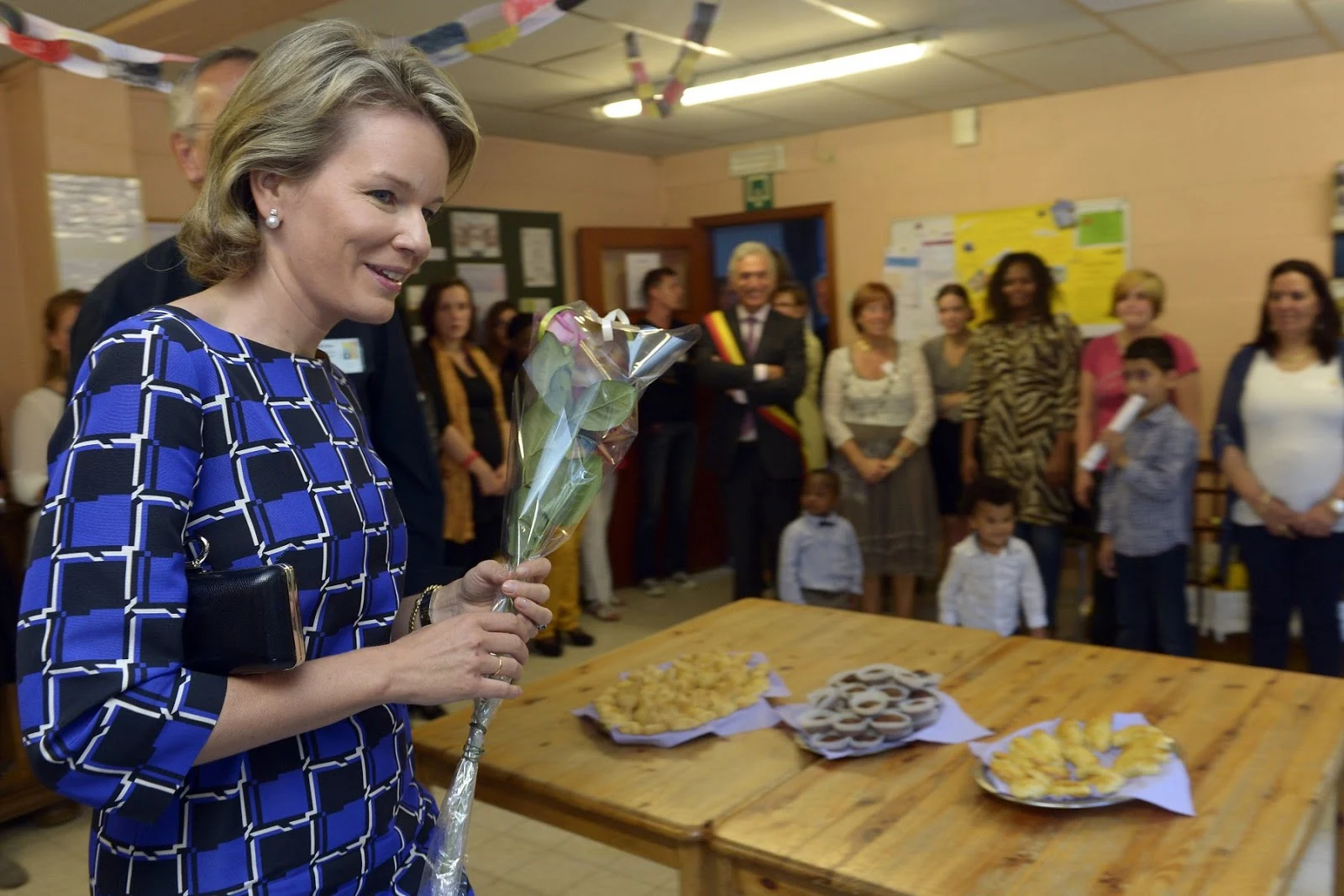 Queen Mathilde also took the time to speak with the people this work is all about, the people in need of the work of these institutions.