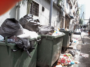GARBAGE DUMPS ON THE RIGHT OF YARL RESTAURANT