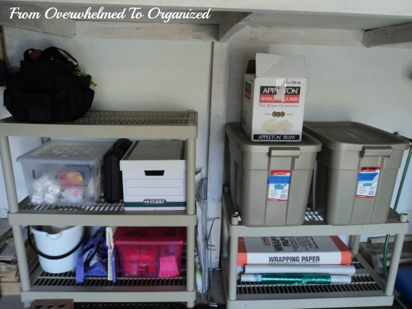 From Overwhelmed to Organized plastic shelves and bins organized in garage.
