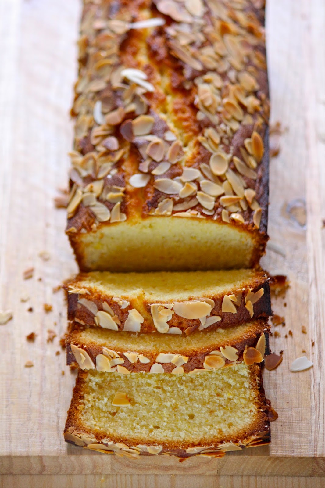 Plateful Orange Almond and Yogurt Loaf—light, moist, and deliciously