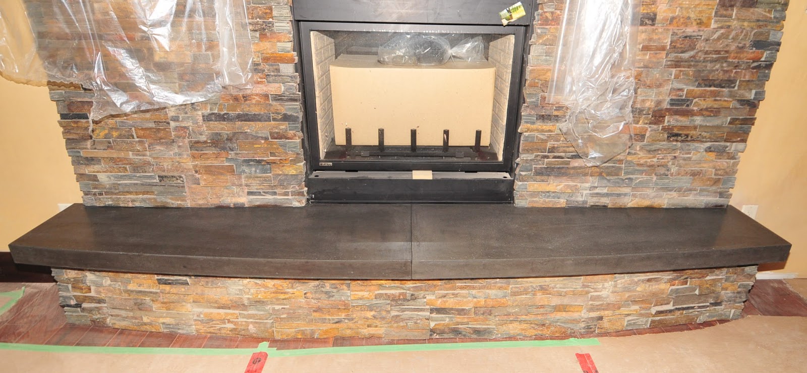 MODE CONCRETE Add Excitement to a Beautiful Fireplace with a Concrete