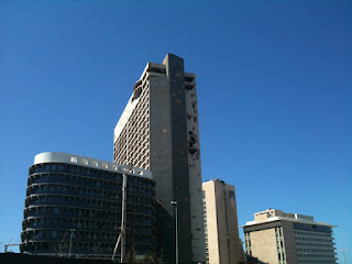 a group of buildings with blue sky