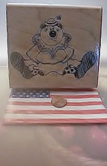 http://www.storenvy.com/products/12085029-d-o-t-s-sitting-clown-large-wood-mounted-rubber-stamp-r-110