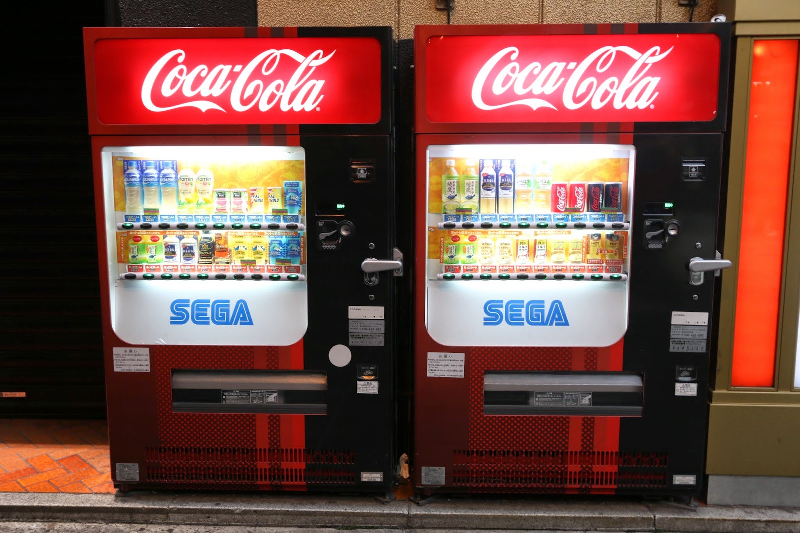 An interesting softdrink dispenser machine with co-sponsor by Sega at Akihabara in Tokyo, Japan An interesting softdrink dispenser machine with co-sponsor by Sega at Akihabara in Tokyo, Japan