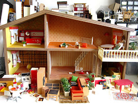 1975 Lundby dolls' house, with a selection of non-Lundby furniture in front of it.