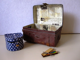 Miniature blue and white polka dot hat box, vintage tin trunk and crayon box with scissors.