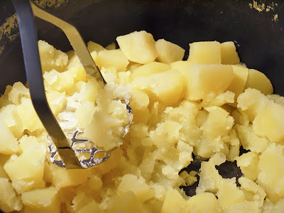 Ecrasée de pommes de terre (voir la recette)