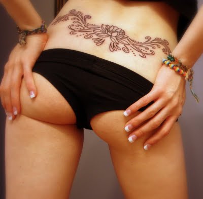 The decision to place beautiful tattoo designs on ones lower back has been