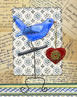 Bird with Heart Locket
