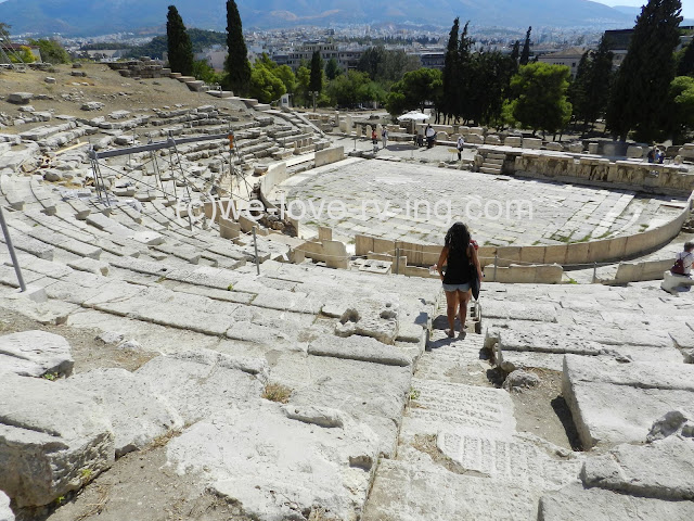 we walk down through the rows of seats leading to the stage