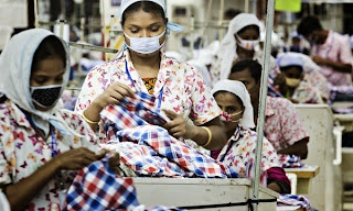 Bangladeshi garment workers in production