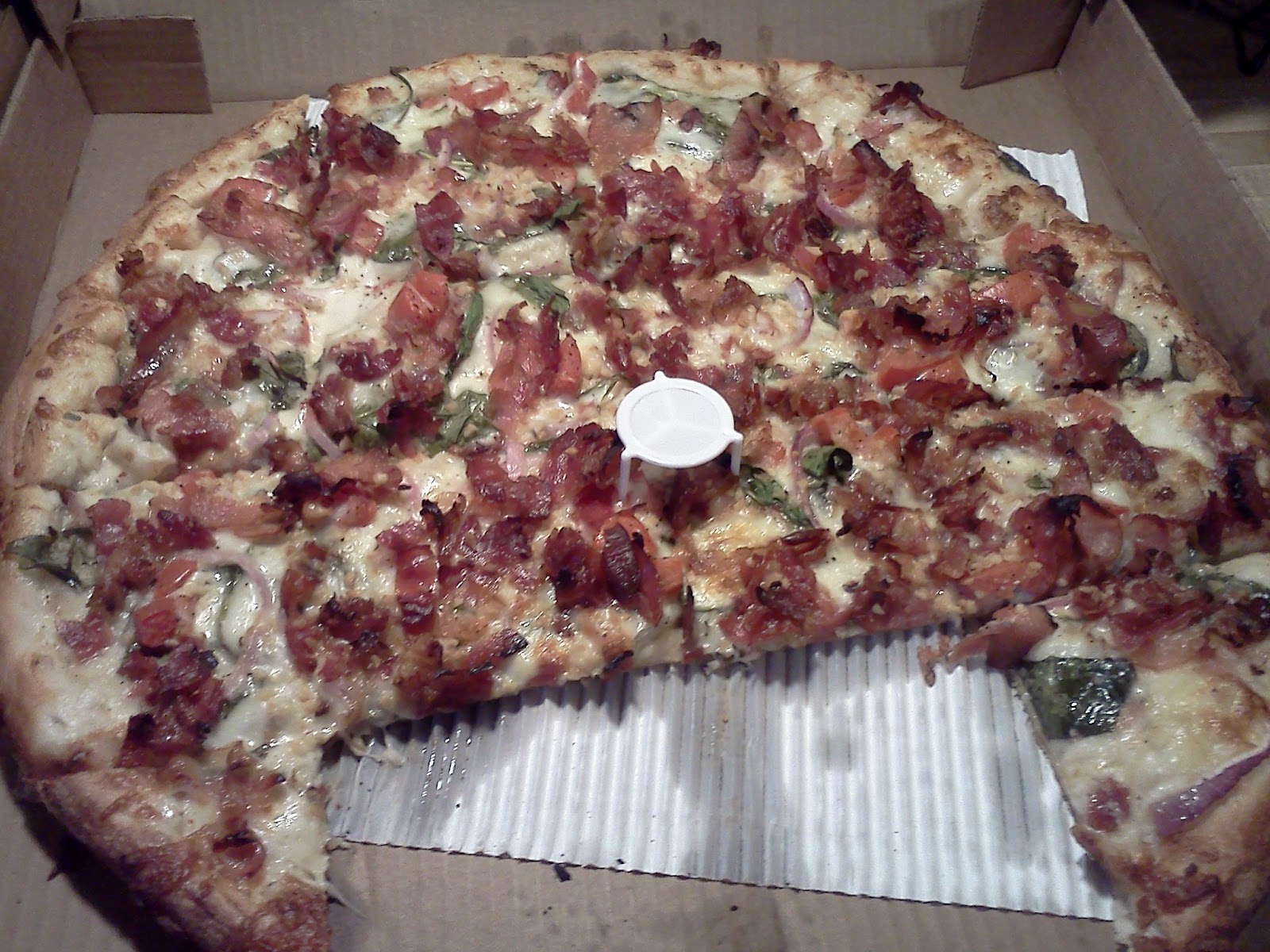 Top This Mastering the Art of the Pony Keg Pizza at Trotta's